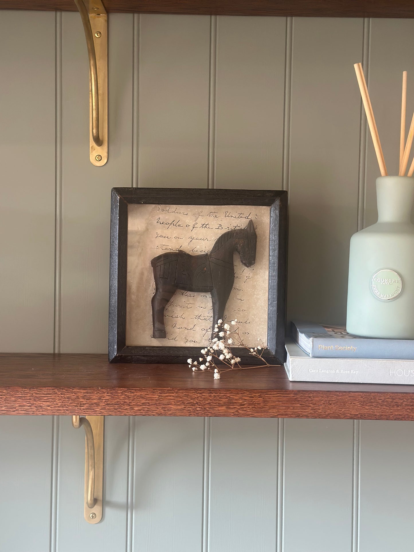 Vintage wooden horse in a box shelf styling piece