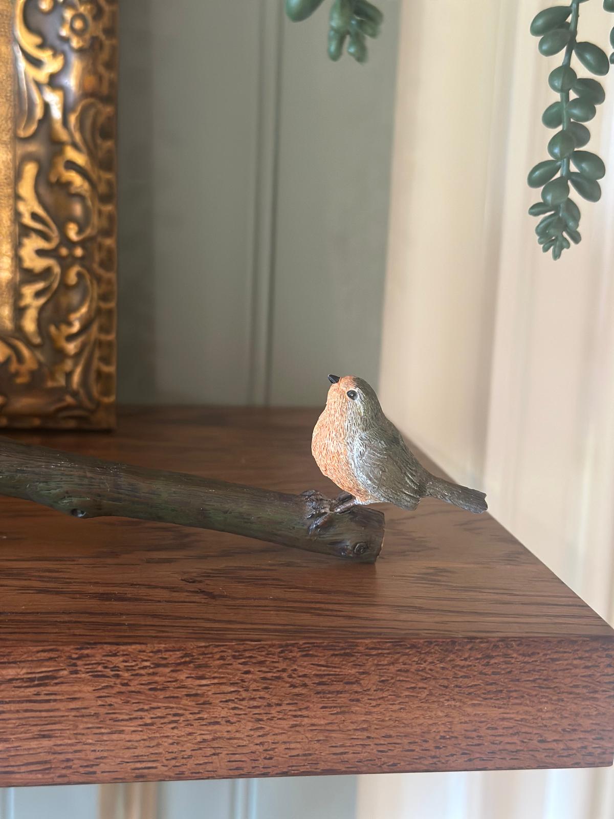 vintage candle snuffer with Robin red breast