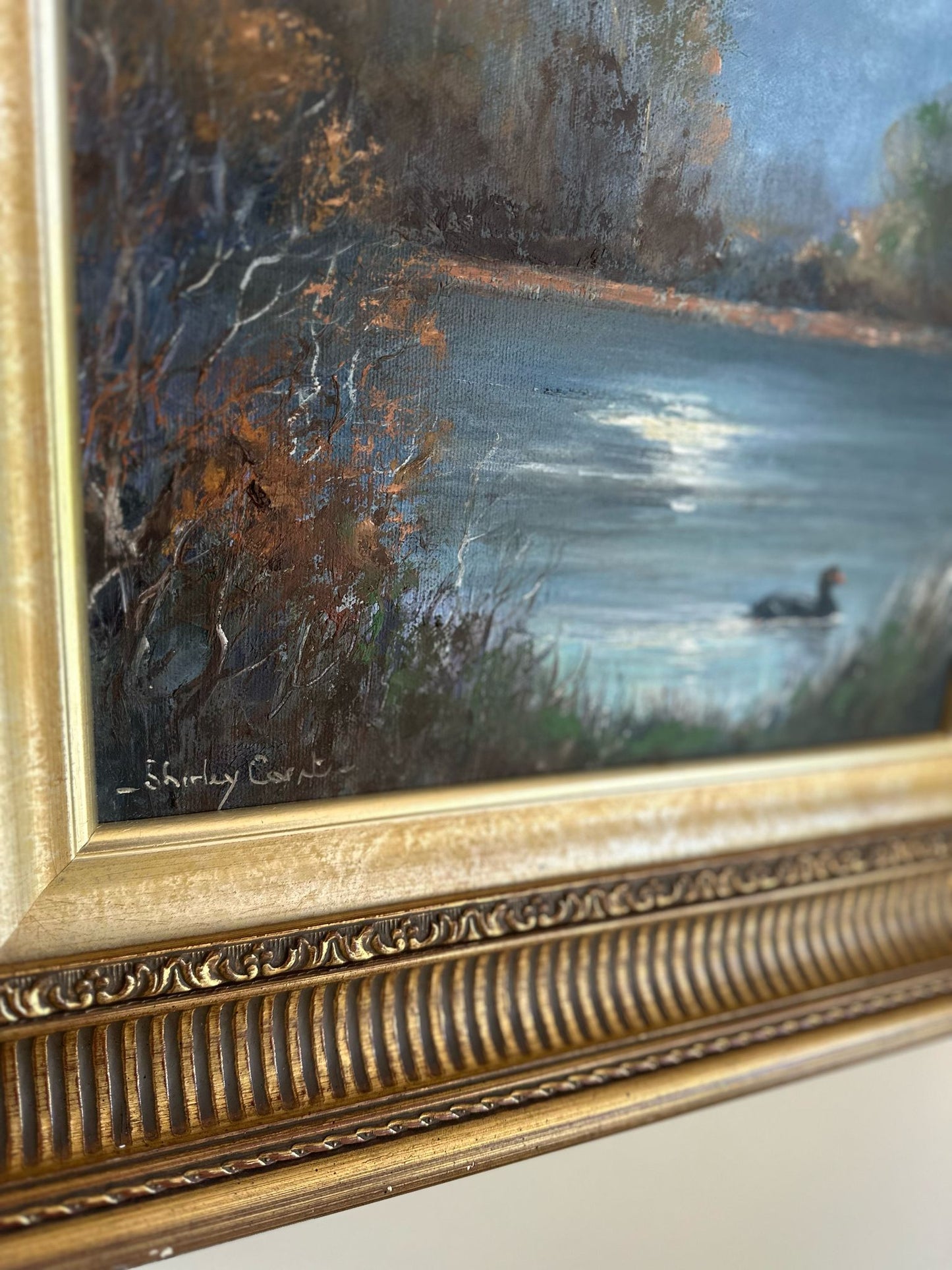 vintage oil painting of a duck at night framed