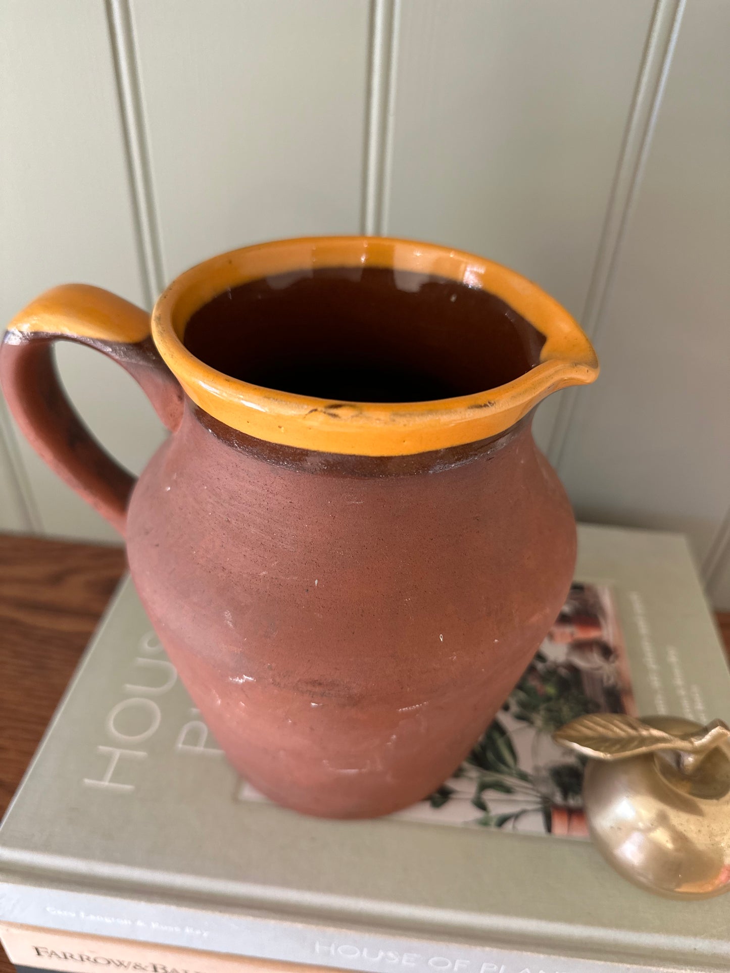 Vintage terracotta jug glaze lip