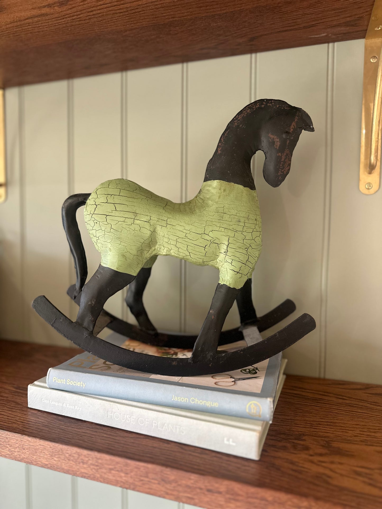 Vintage iron rocking horse styling piece