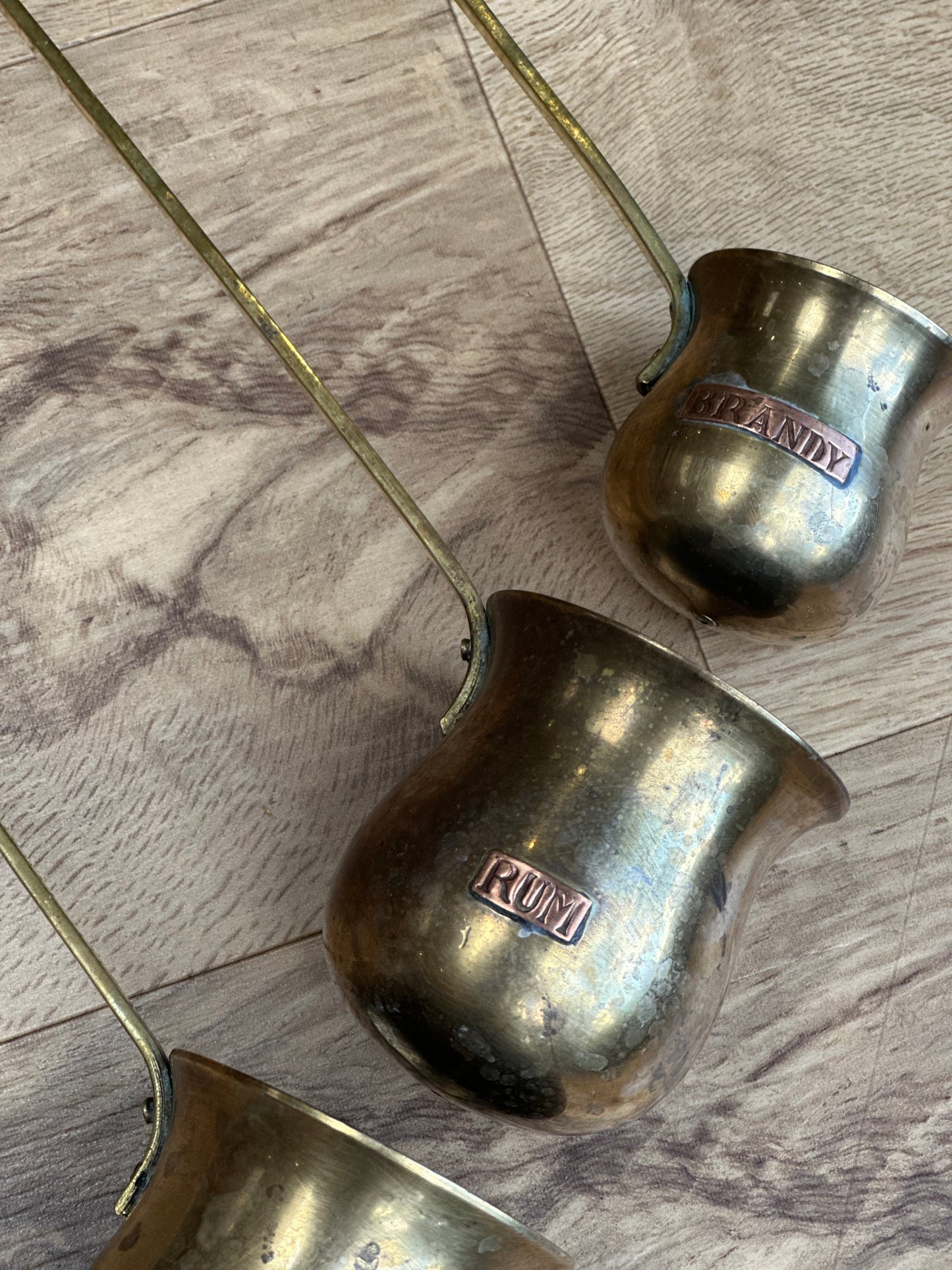 Vintage brass hanging measure cups