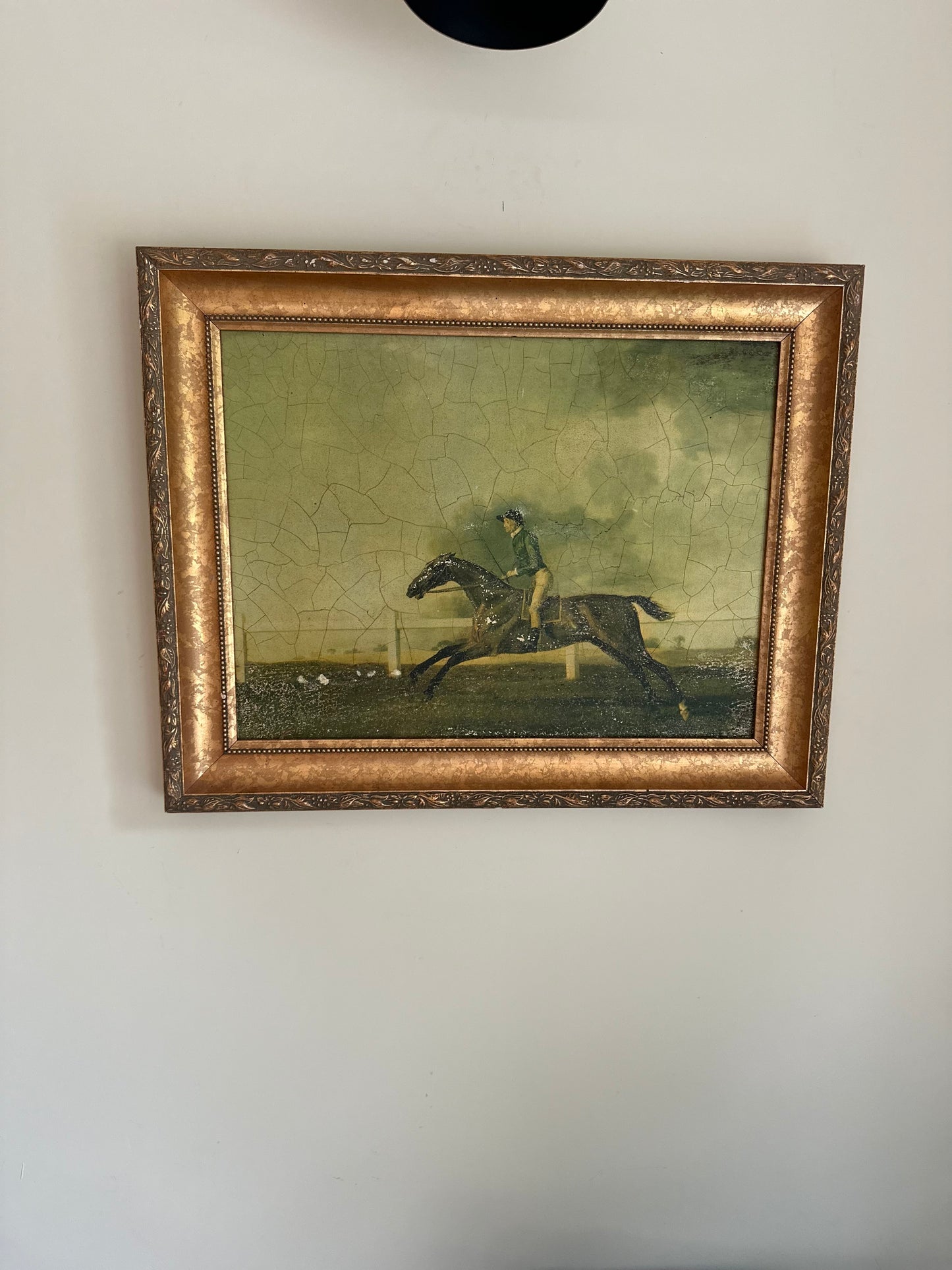 Framed oleograph of a racing horse vintage