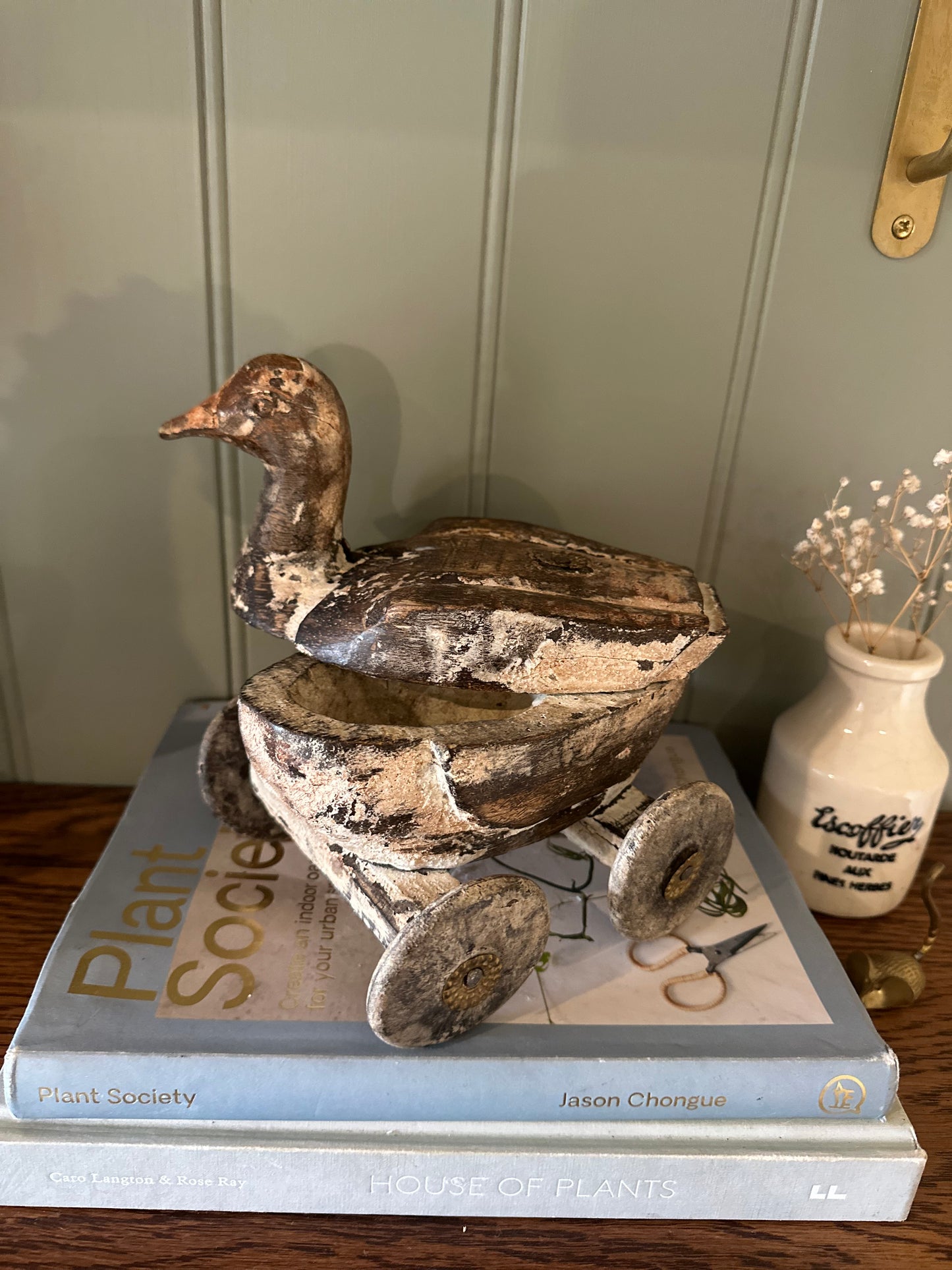 Vintage wooden duck with wheels & secret compartment