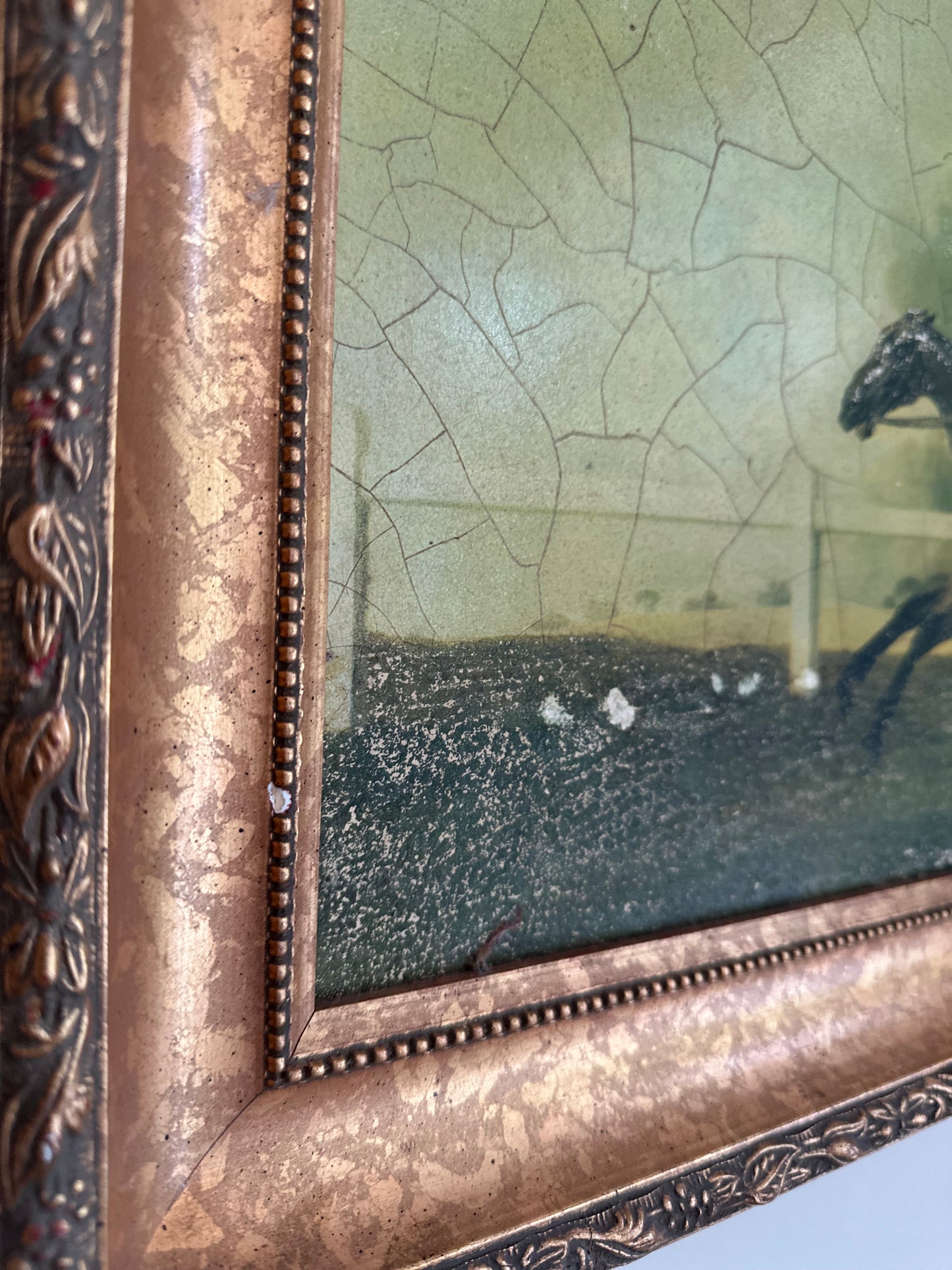 Framed oleograph of a racing horse vintage