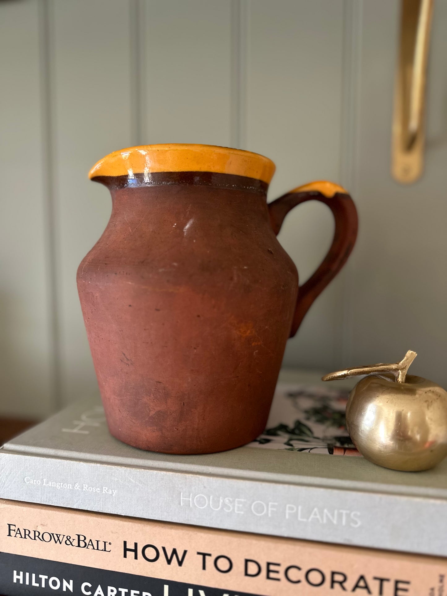 Vintage terracotta jug glaze lip