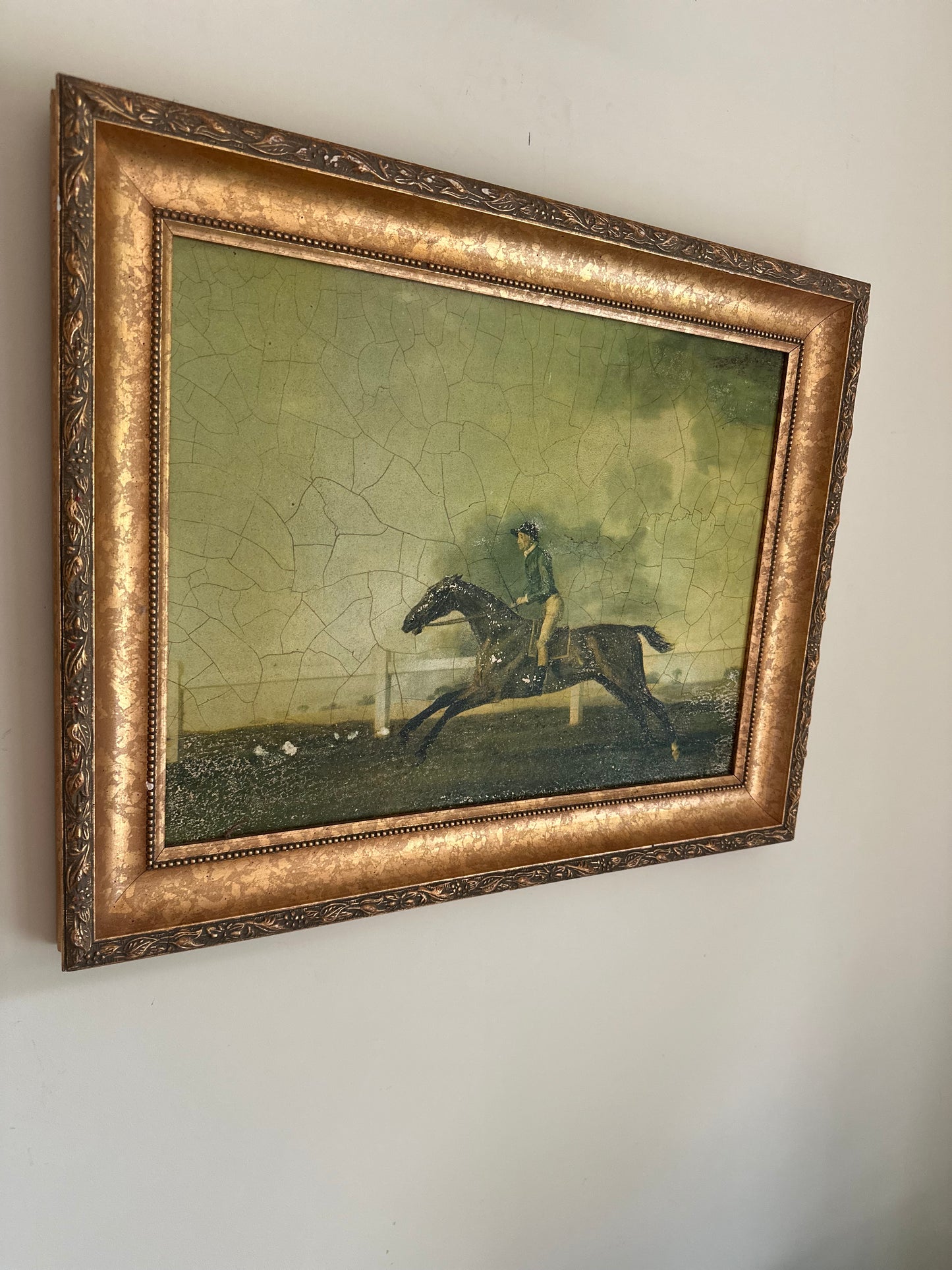 Framed oleograph of a racing horse vintage