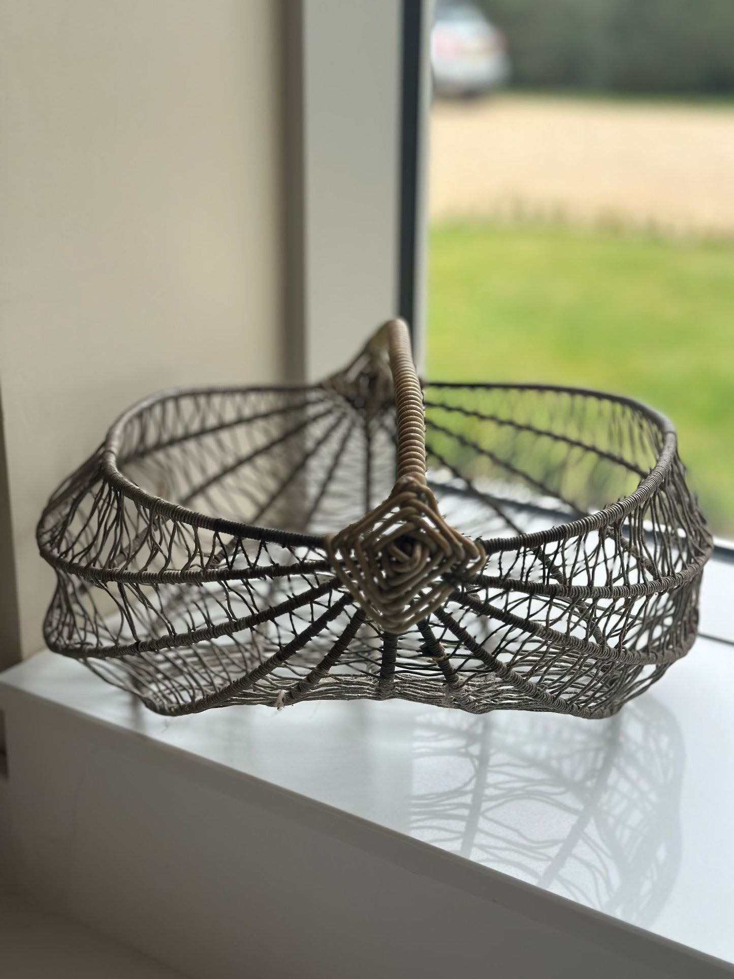 vintage French wire basket with wicker handle.
