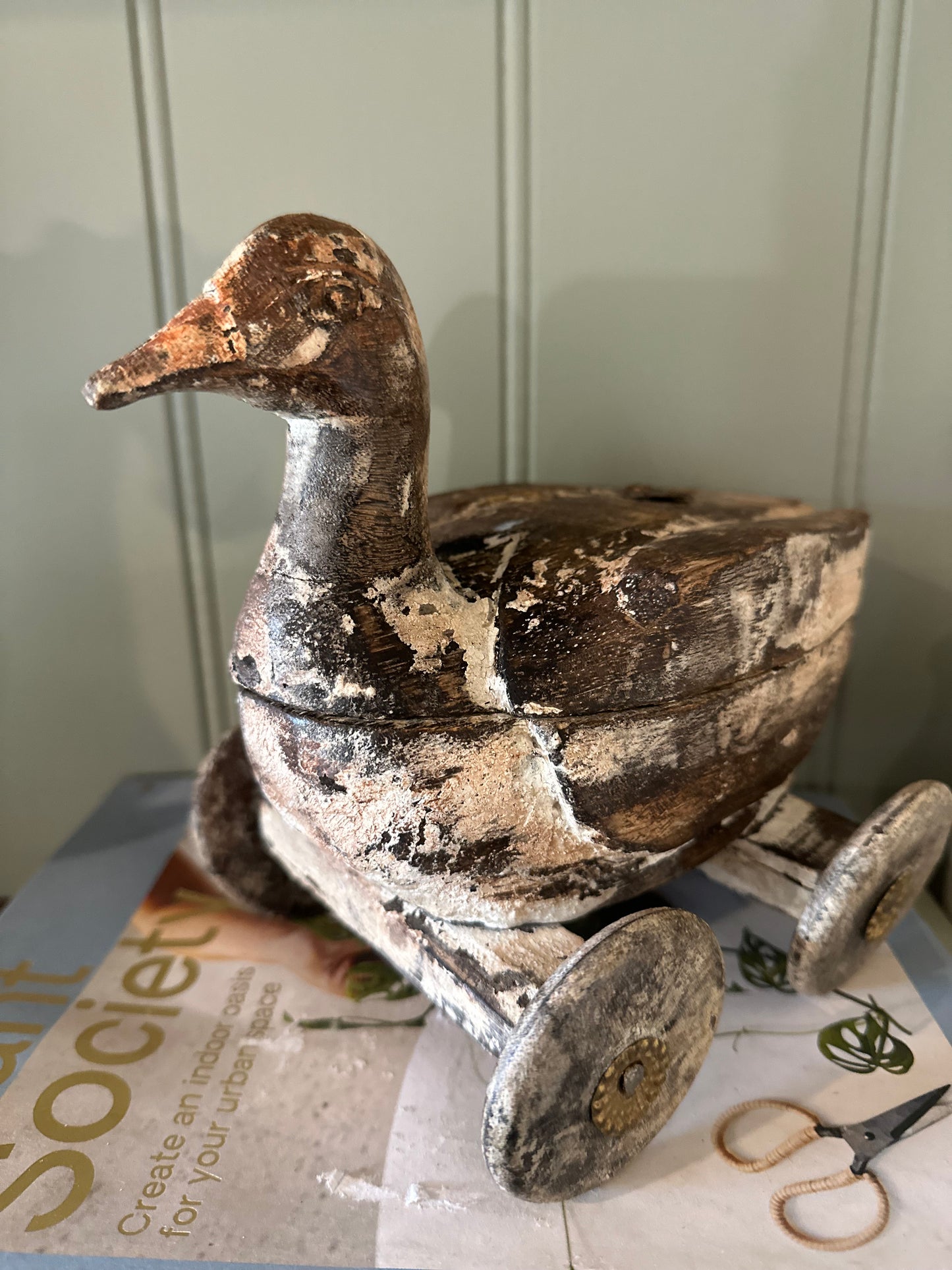 Vintage wooden duck with wheels & secret compartment