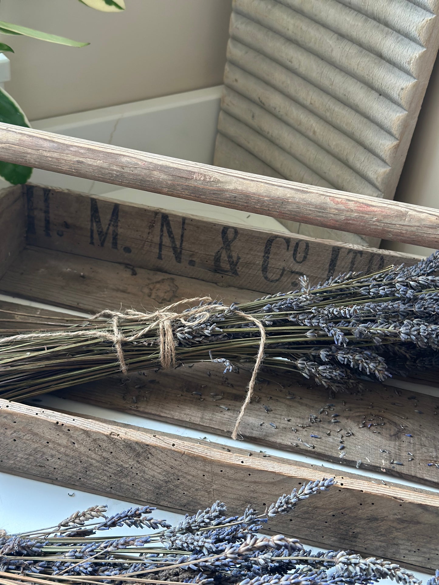 Vintage wooden flower trug with advertising