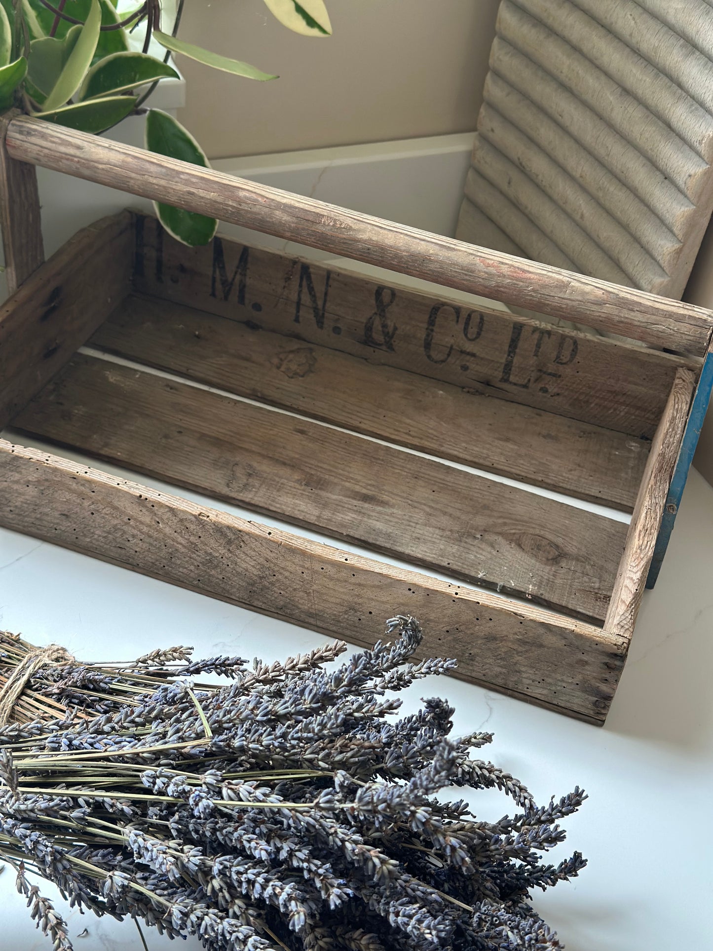 Vintage wooden flower trug with advertising