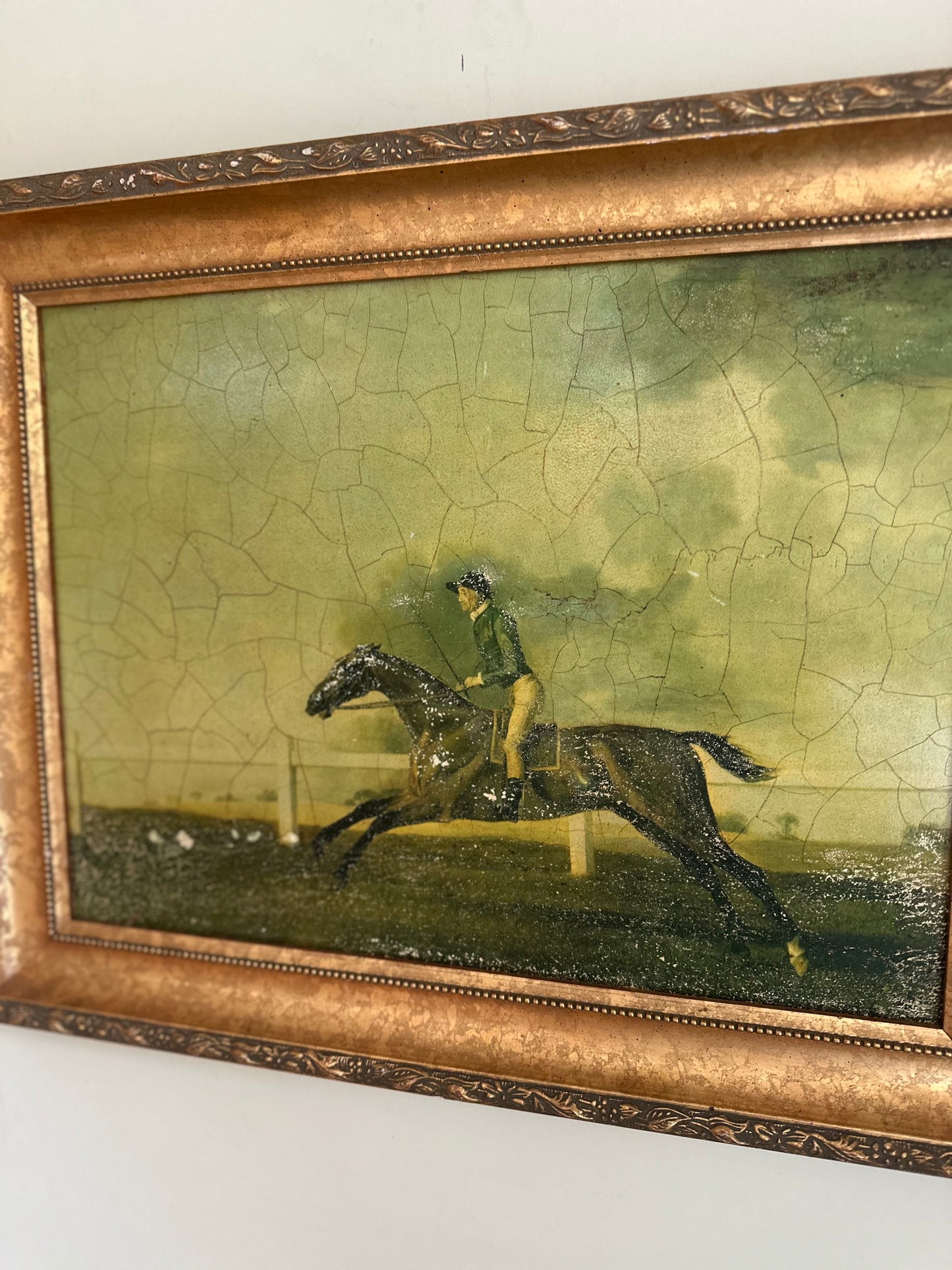 Framed oleograph of a racing horse vintage