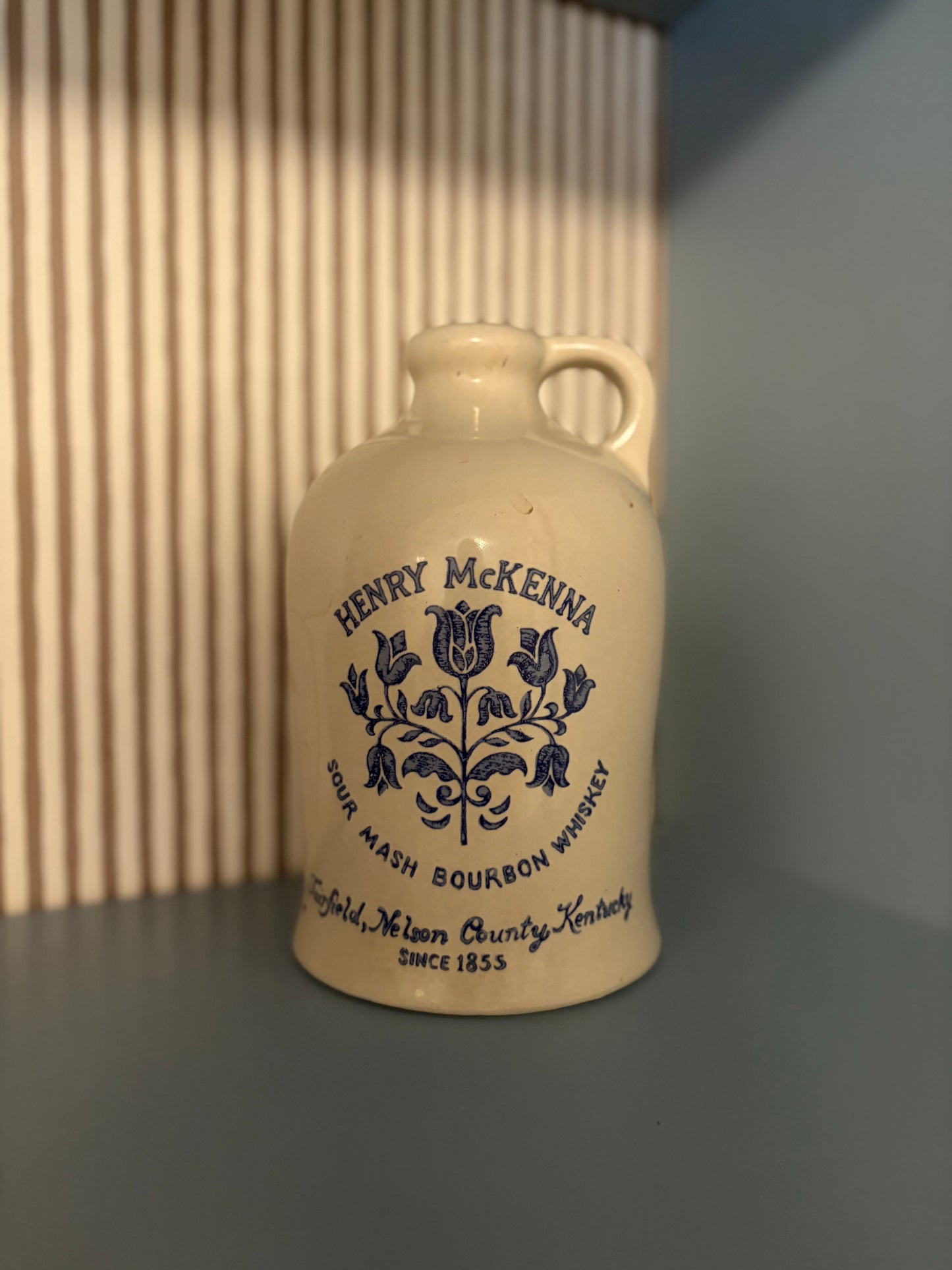 Cream & blue whisky advertising urn