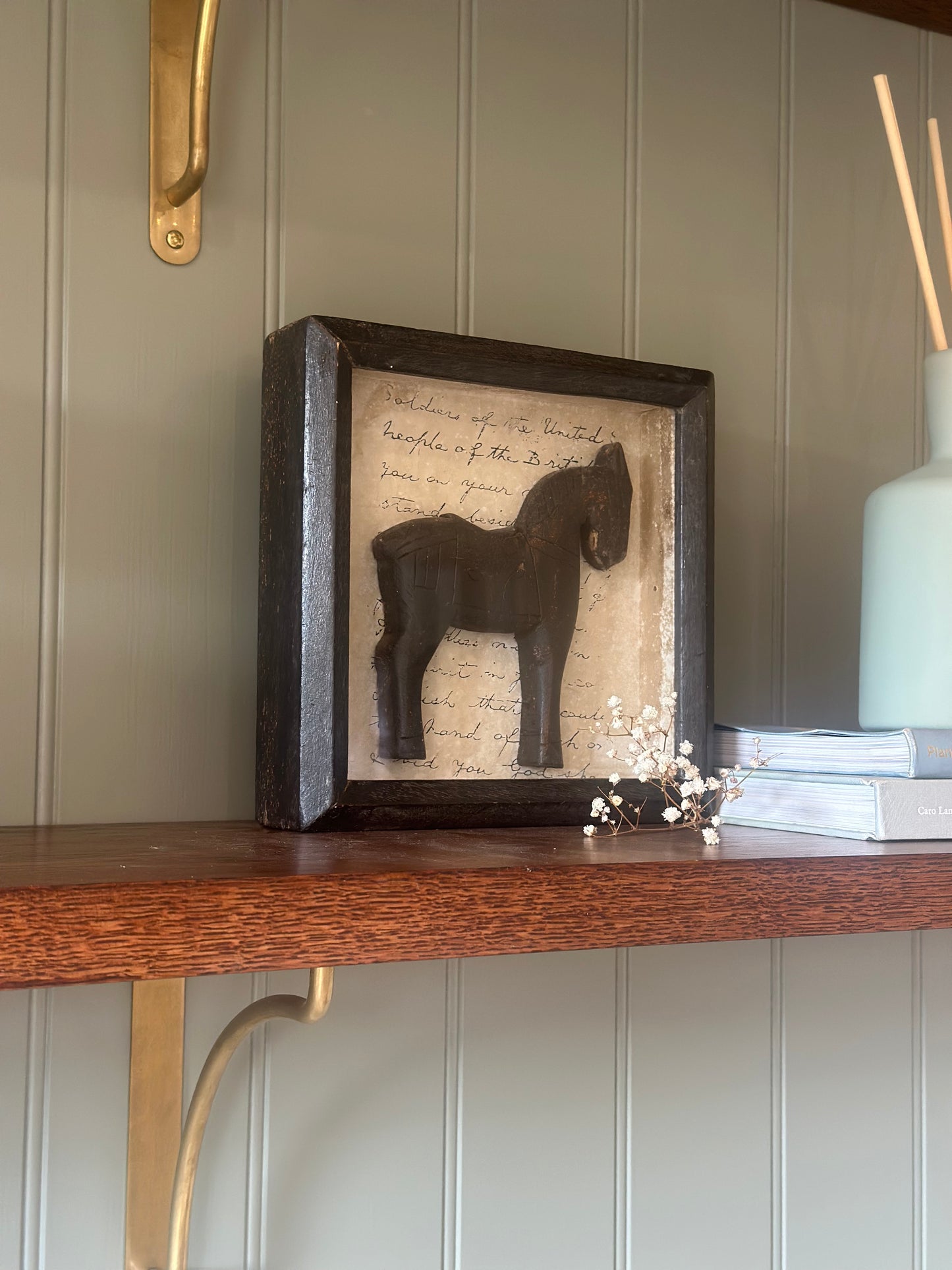 Vintage wooden horse in a box shelf styling piece