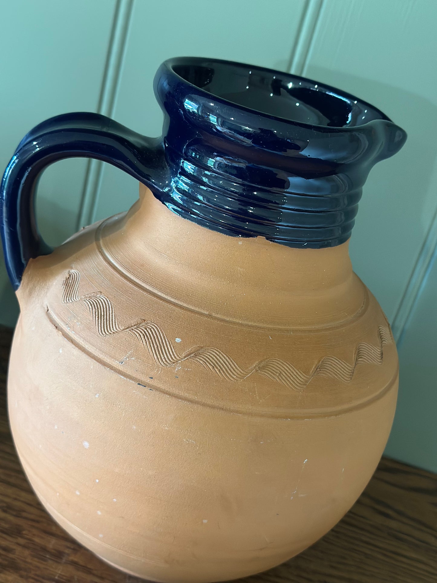 Vintage Greek water wine jug with material beaded lid