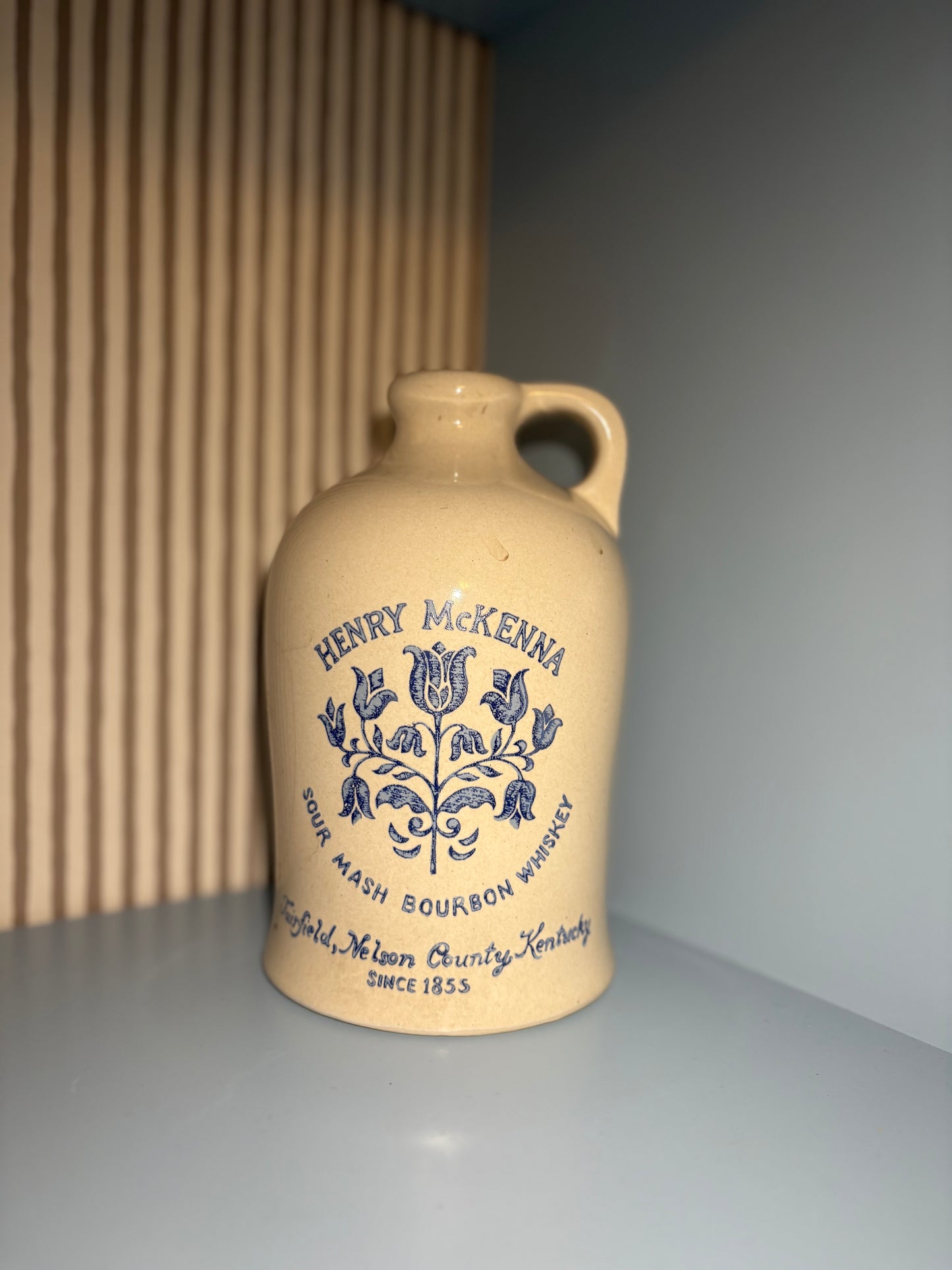 Cream & blue whisky advertising urn