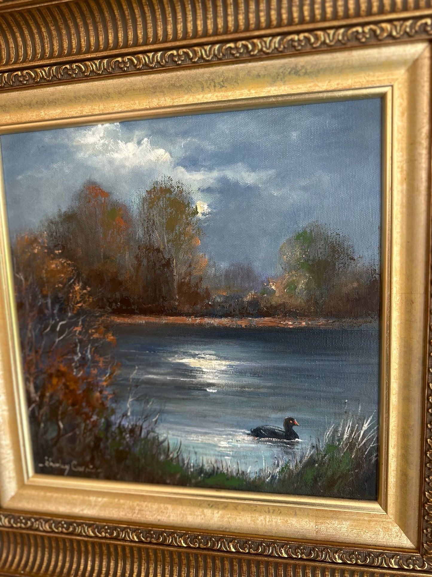 vintage oil painting of a duck at night framed