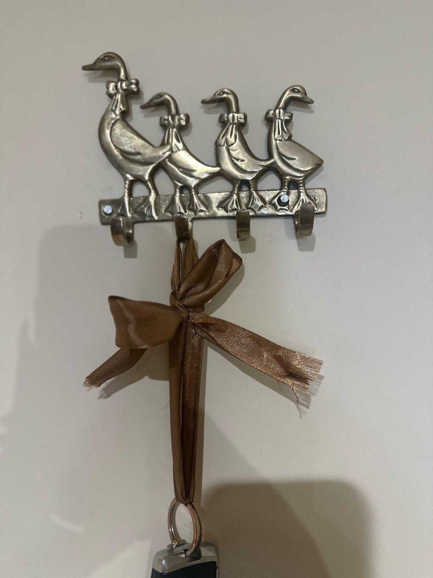geese family key hooks vintage brass
