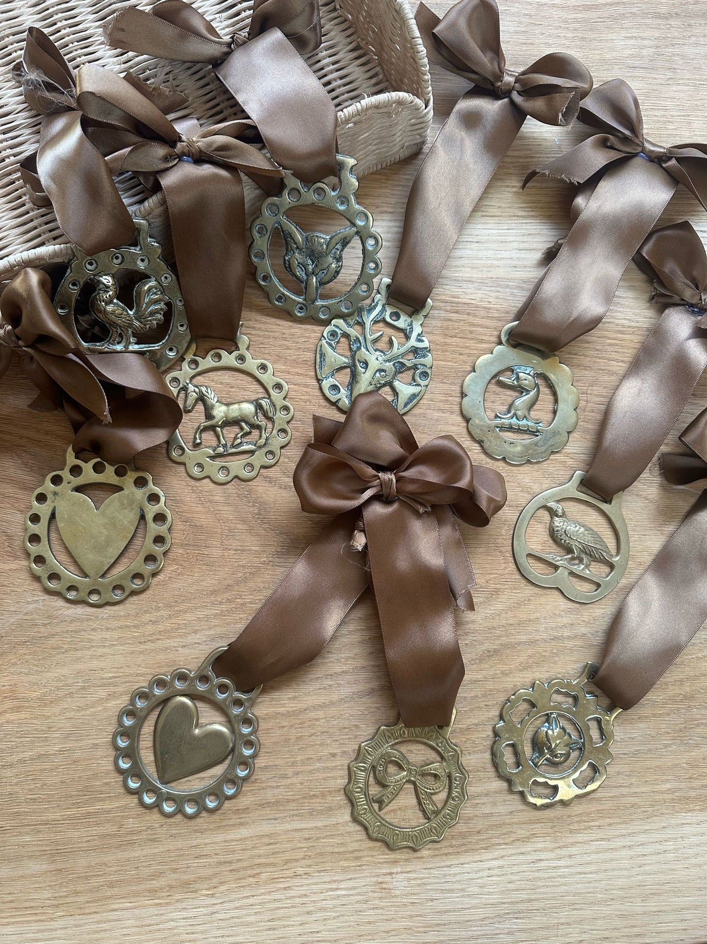 vintage brass token on bow ribbon