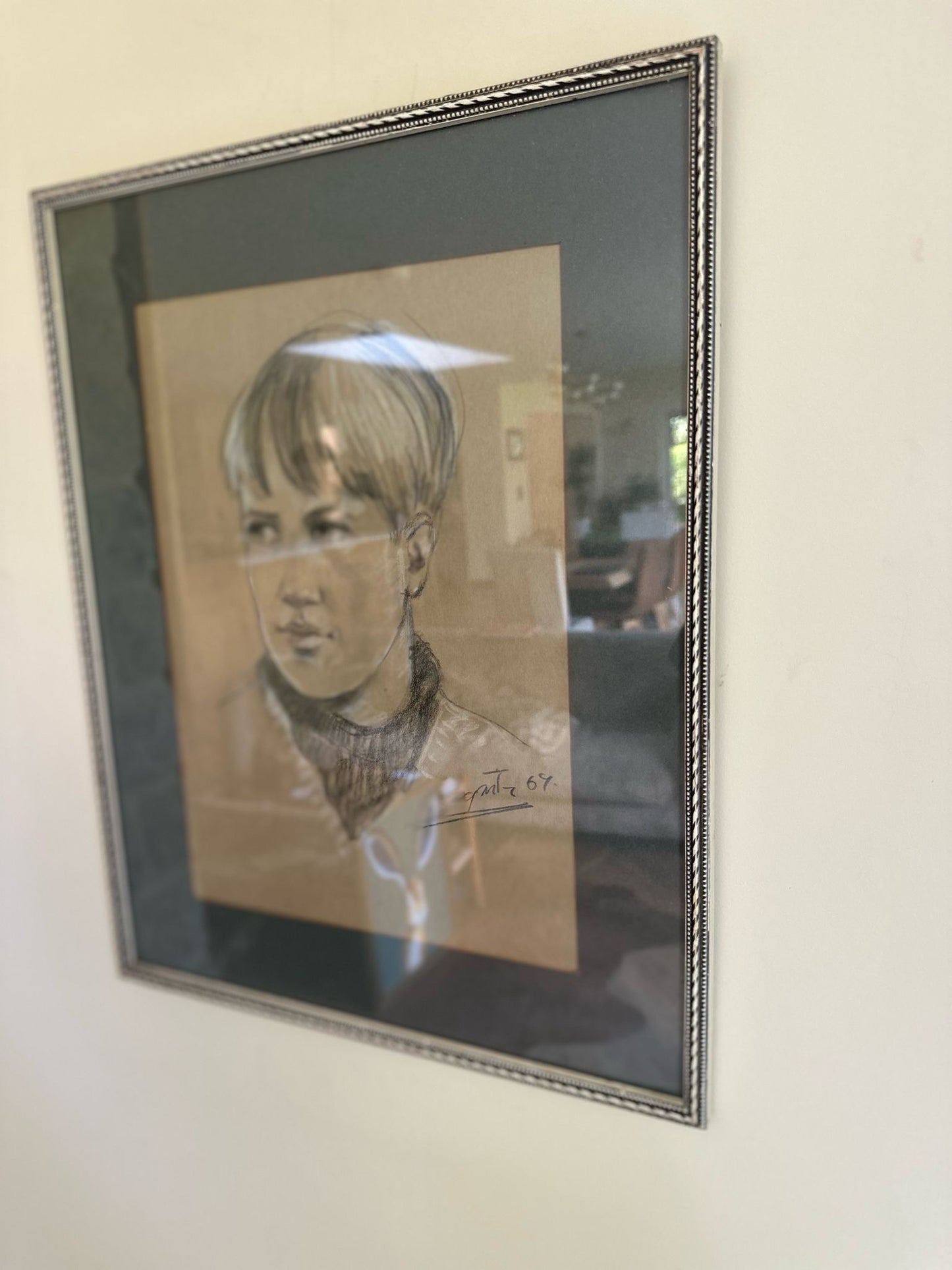 pencil of boy signed & framed neutral colours