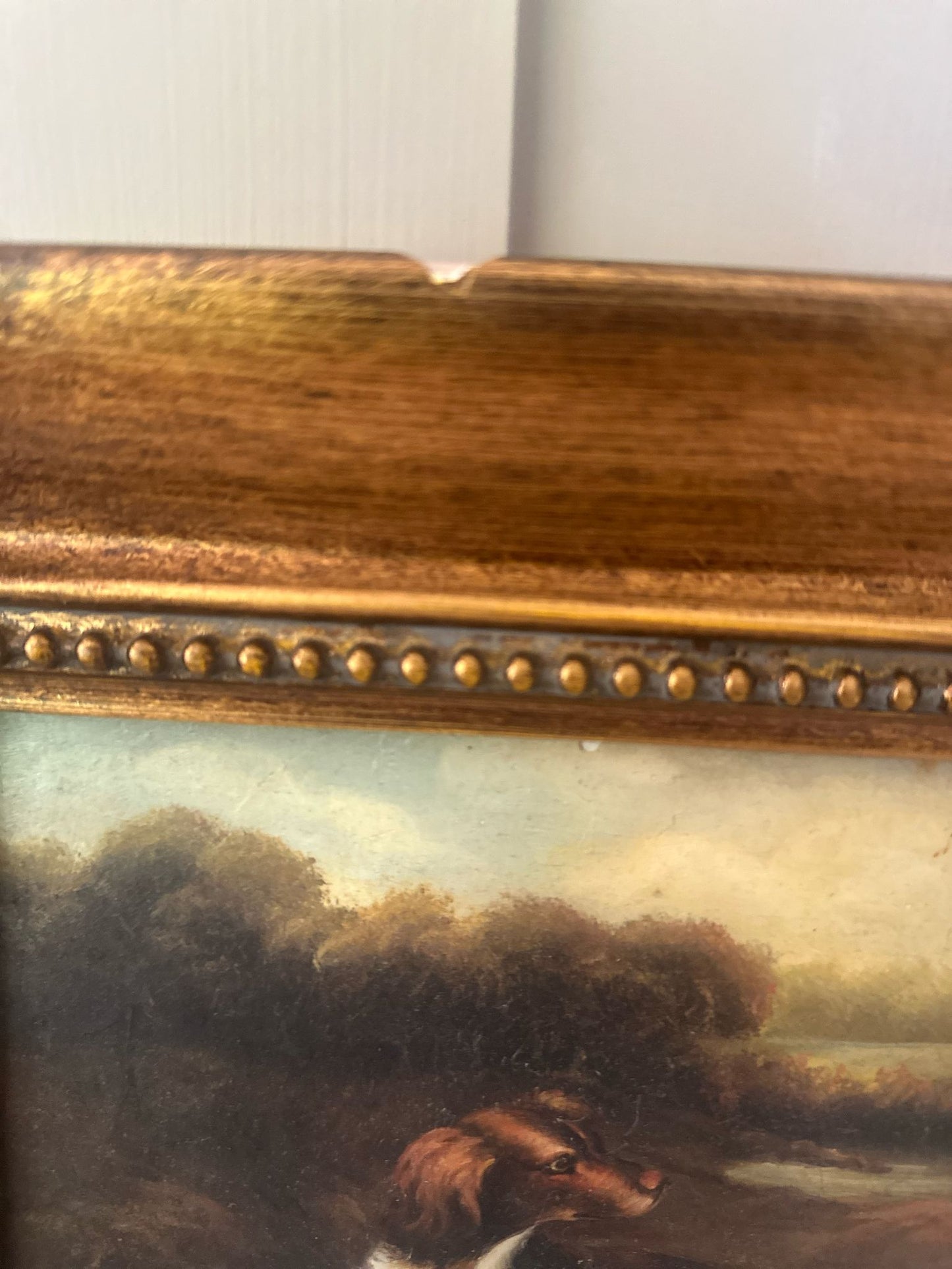 framed oleograph of dogs