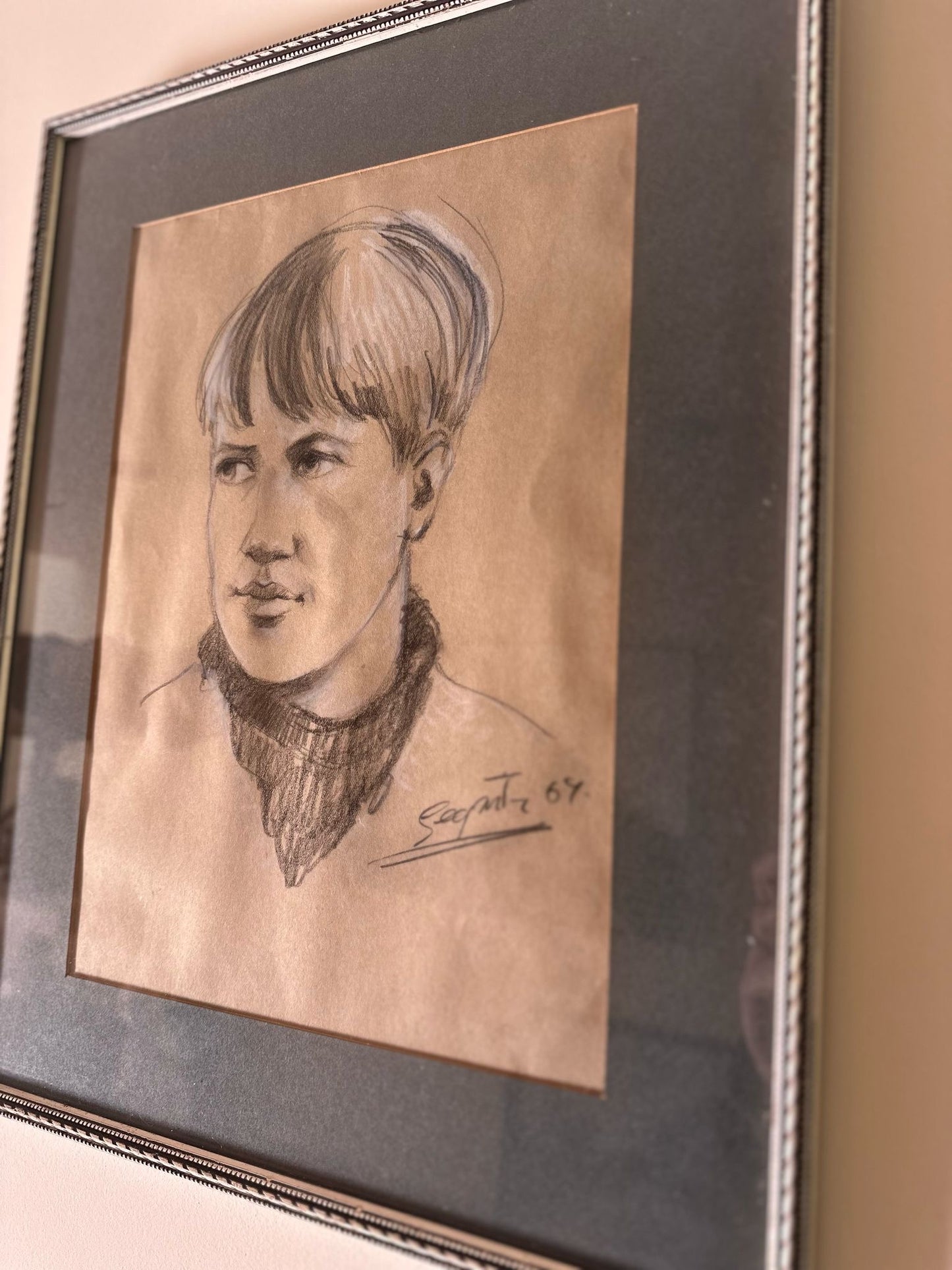 pencil of boy signed & framed neutral colours