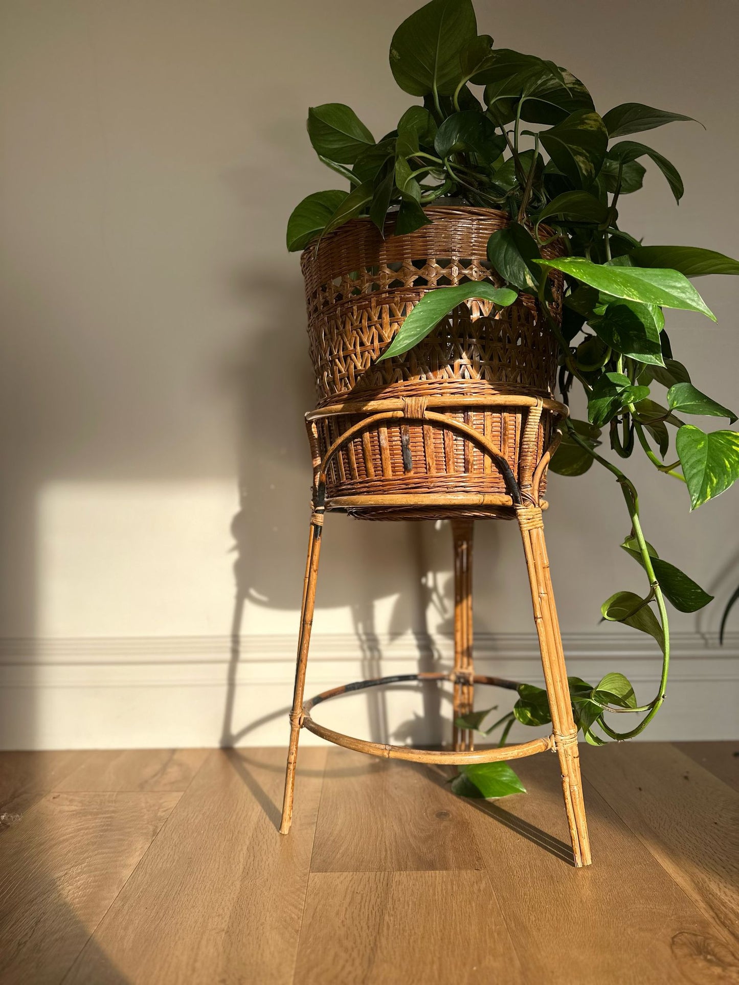 vintage wicker tall plant stand and basket