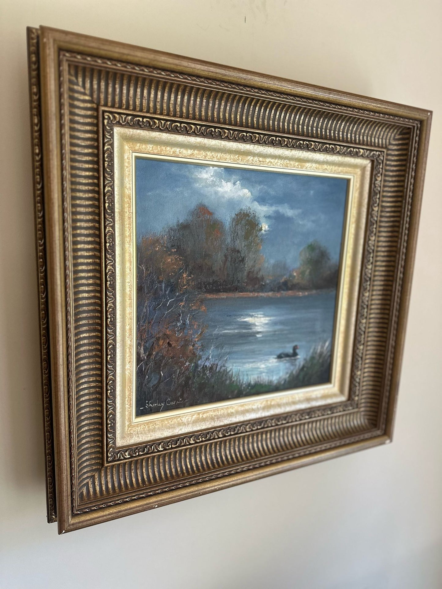 vintage oil painting of a duck at night framed