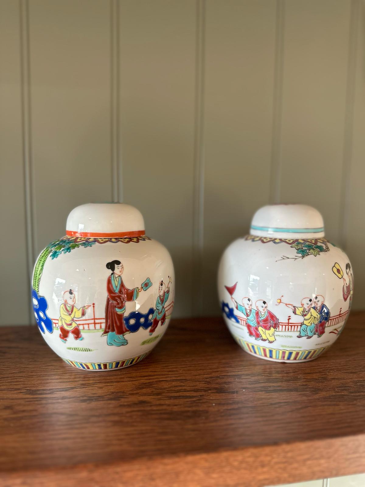 pair of vintage Chinese ginger jars with lids