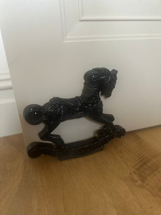 Vintage cast iron rocking horse doorstop