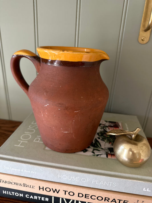 Vintage terracotta jug glaze lip