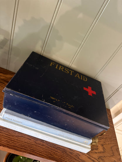 Vintage first aid tin storage