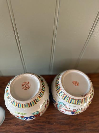 pair of vintage Chinese ginger jars with lids