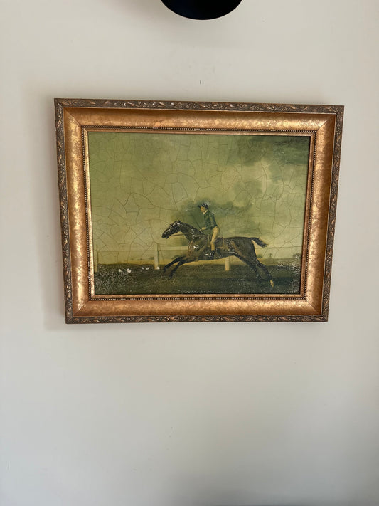 Framed oleograph of a racing horse vintage