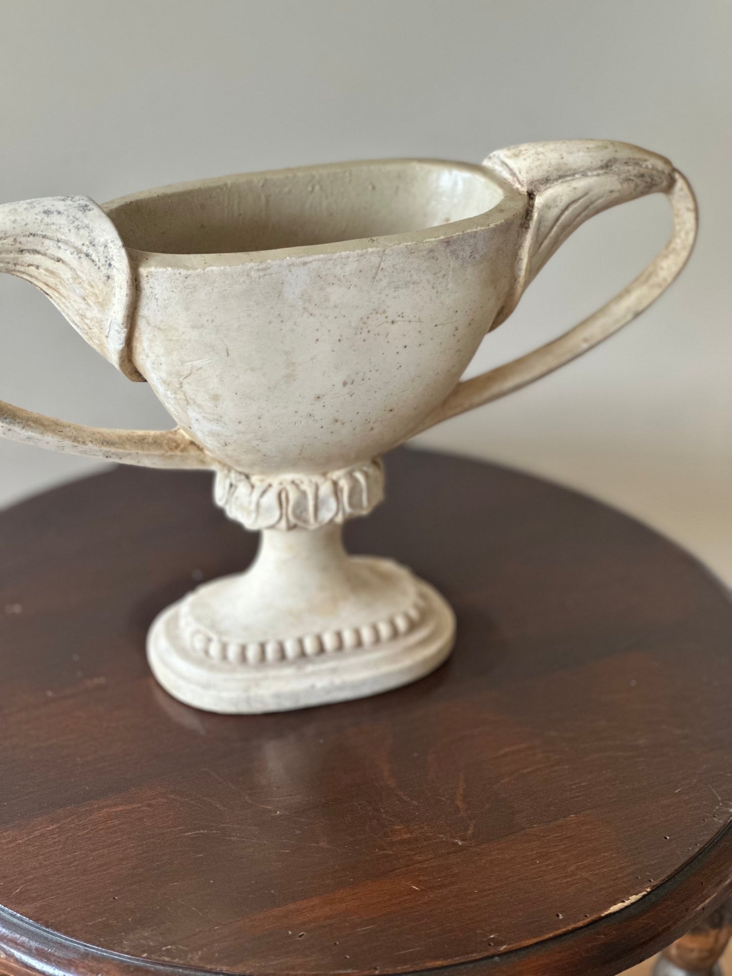 Ornate stone style mantel vase
