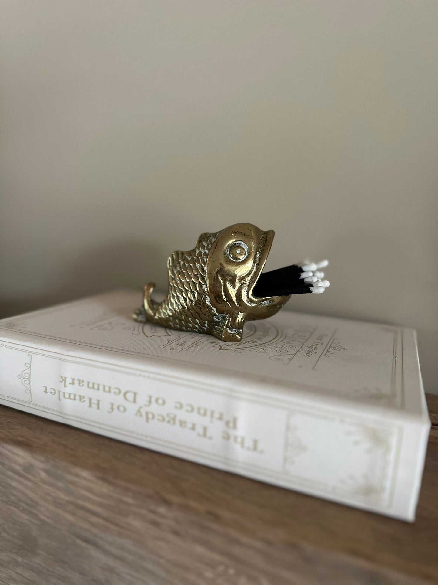 Vintage brass fish match holder