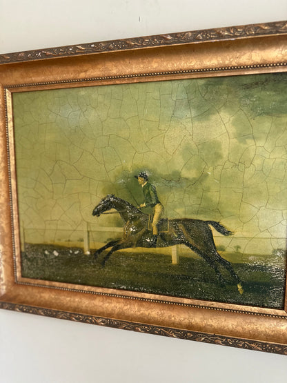 Framed oleograph of a racing horse vintage