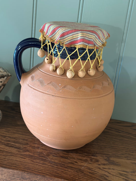 Vintage Greek water wine jug with material beaded lid
