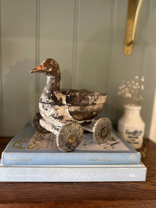 Vintage wooden duck with wheels & secret compartment