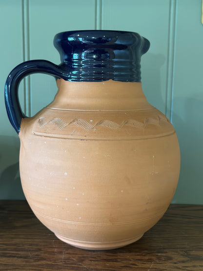 Vintage Greek water wine jug with material beaded lid